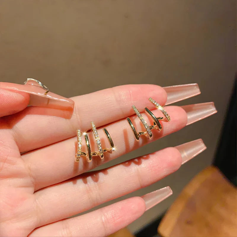 💎 GeoShine™ – Brincos Geométricos com Revestimento em Ouro/Prata e Zircônia