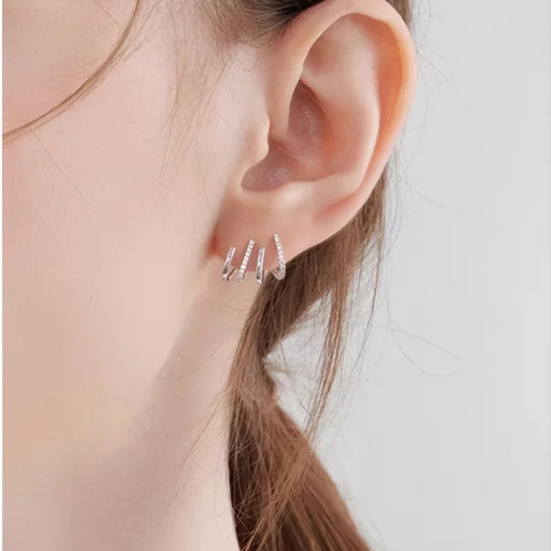 💎 GeoShine™ – Brincos Geométricos com Revestimento em Ouro/Prata e Zircônia